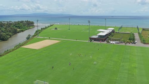 Aerial view of bali united training center football pitches