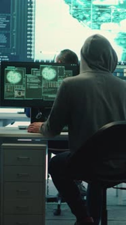 Vertical Video Cyber Operations Center with Governmental Hackers Working on Digital Security