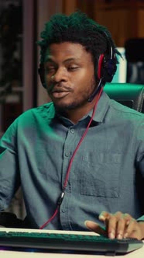 Vertical Video Close Up Shot of Player Streaming Videogame Discussing with Viewers