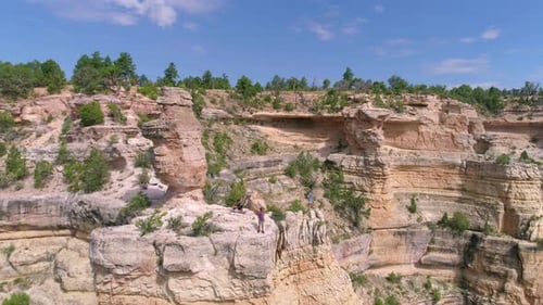Hikers Looking Into the Grand Canyon by Aerial Drone 4 Person
