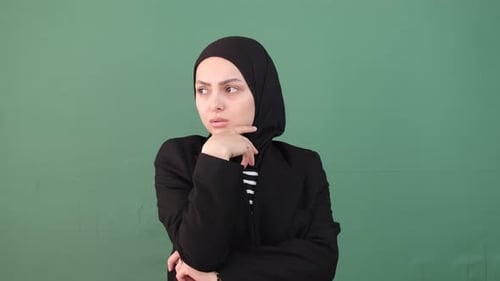 Woman Touching Face with Contemplative Look