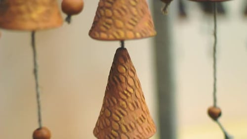 Chinese Bells Hanged Indoors. Close Up of Antique Feng Shui Amulet For