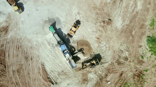Aerial View of Construction Vehicles at Work Site