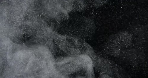 Dust Particles Blast on Black Screen in Slow Motion