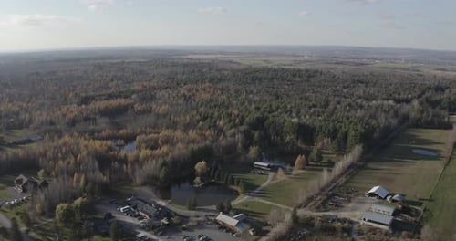 Drone aerial clip of a beautiful woods and farm land property during the fall season in the Ottawa r
