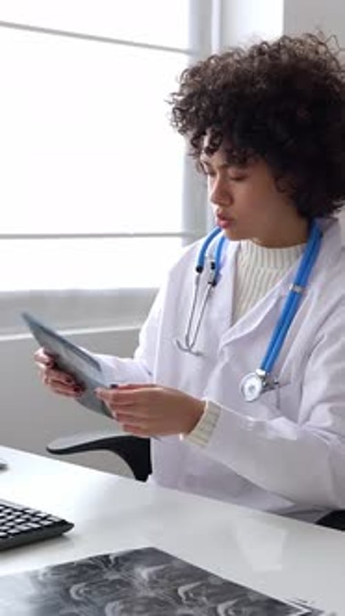 Doctor and Patient Talking in a Medical Consultation in a Clinic