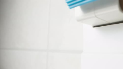 I turn on the blue circuit breaker. Dolly slider extreme close-up.