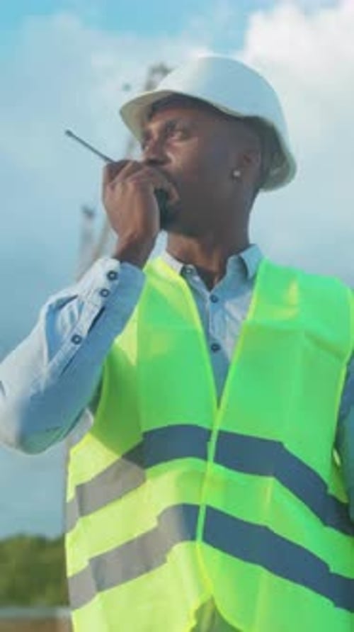 Leader Coordinating Urban Building Site Foreman Supervising Project with Communication and Safety