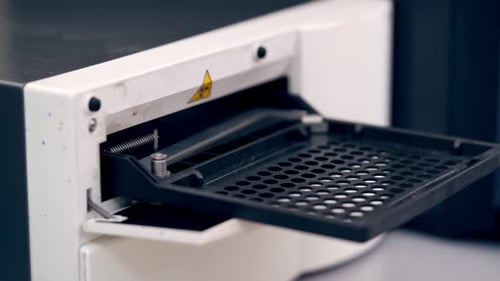 Automated machine in the laboratory. Modern apparatus in pharmacology.