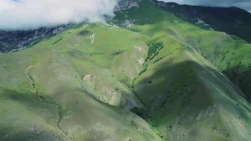 Aerial of Northern Caucasus Mountains on a Bright Sunny Day Majestic Scenery of Highlands of Region