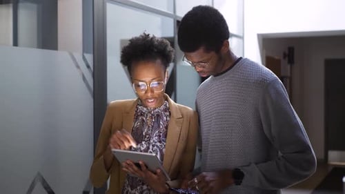 Business Teamwork Using Digital Tablet in Office