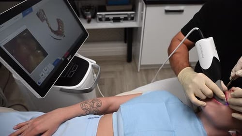 Dentist Using 3D Dental Intraoral Scanner For Scanning Teeth Patient's Modern Dentistry And