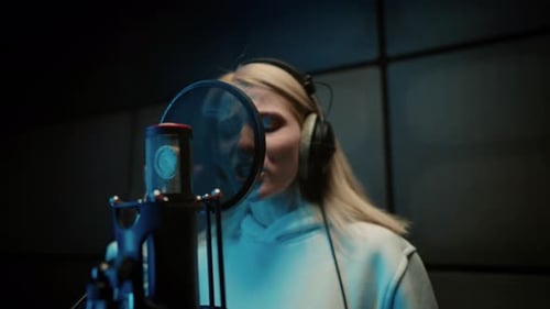 Professional Singer Woman Performing Beautiful Love Ballad in Recording Studio Young Lady Recording