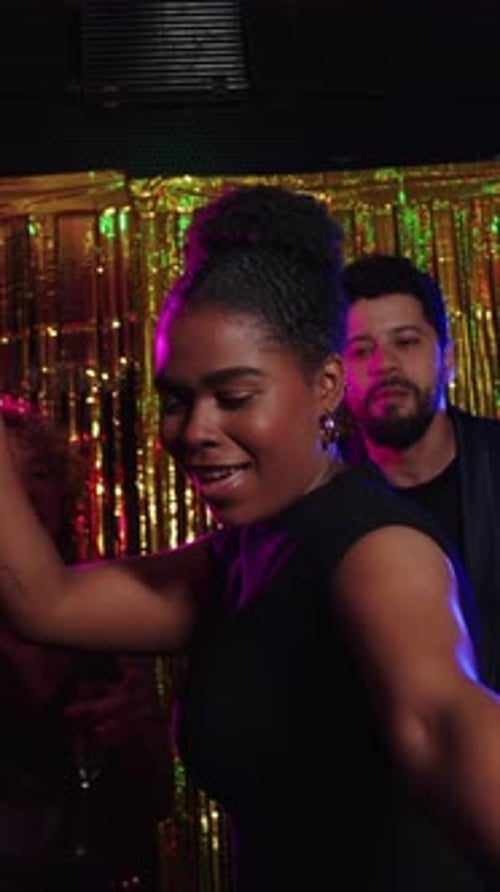 Friends Celebrating Birthday at Vibrant Nightclub Party