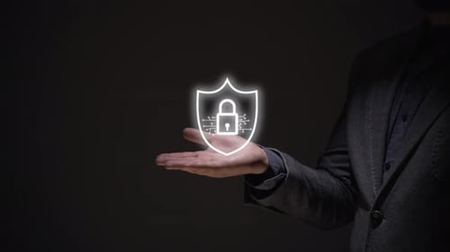 cyber security concept. business person displays electronic lock hologram.