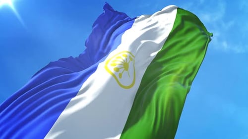 Vivid Waving Flag Animation with Circular Emblem Against Blue Sky