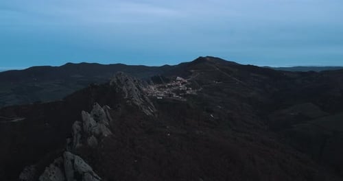 Aerial view of Pietrapertosa atop mountain, Italy.