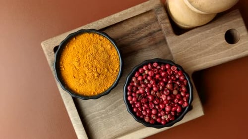 Spices in Bowls on a Wood Tray