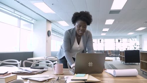 Businesswoman Working at Laptop in Coworking Space Office Adult