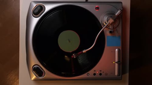 the End of the Record on the Vinyl Player the Recording Stops