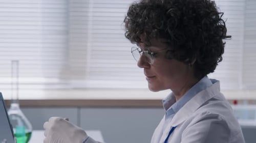 Scientist Doing Medical Research in Laboratory