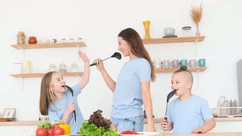 Family Kitchen Fun Singing with Kitchen Spoons