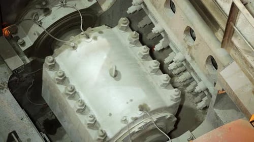 A Detailed Close Up View of Industrial Machinery Components in Action Within the Workshop Stock Clip