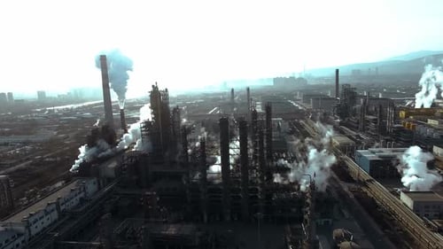 erial view of chimneys of power plant, an industrial district. Modern large thermal power plant