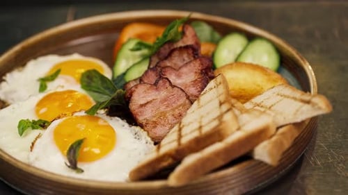 Nutritious Breakfast Plate with Eggs, Bacon, and Toast