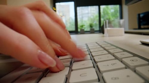 Closeup Female Young Hands Typing and Pressing a Button on a White Office Device Keyboard Nude