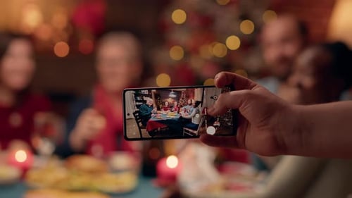 Family Dinner Captured on Phone at Christmas