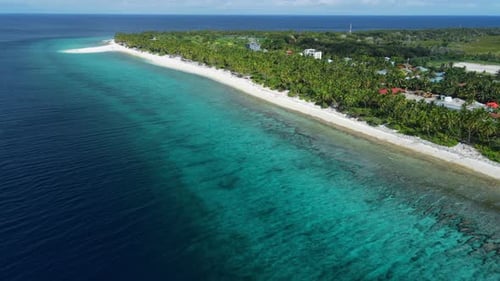 Fuvahmulah Island in Maldives and Ocean Coastline with Tropical Beach on Sunny Day Aerial View