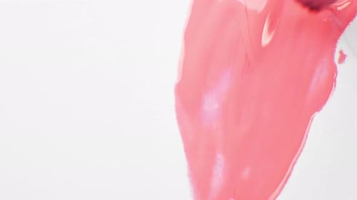 Applying Pink Nail Polish with Brush Close Up