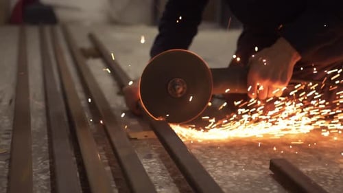 Cutting Iron With Grinder In Small Workshop 4K