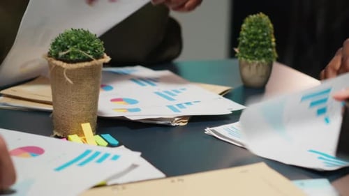 Business People Teamwork in Corporate Office Reviewing Data