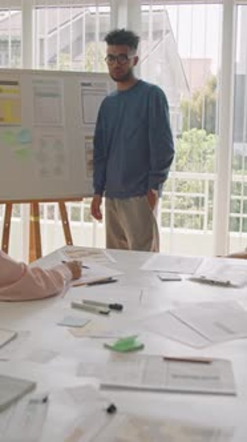 Young Man Giving Presentation by Whiteboard during Lesson