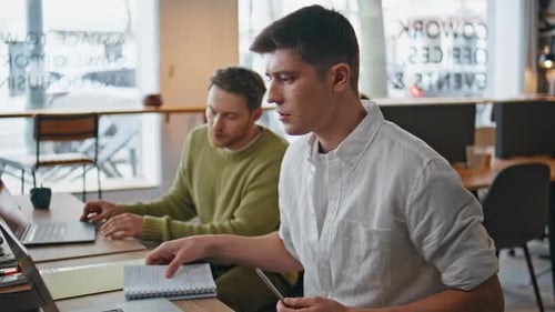 Coworking People Working Computers Closeup Man Asking Colleague at Workplace