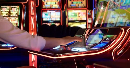 Batumi, Georgia - August 15 2023: Slider shot of modern casino slot machines