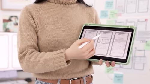 Designer Works on Wireframe on Tablet