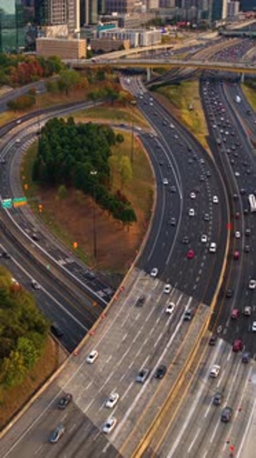 Wide Multilane Highway Crossing Atlanta City Landscape with Recognizable Skyscraper Buildings