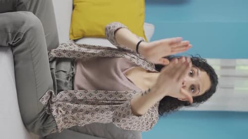 Enthusiastic Woman Clapping and Giving Thumbs Up