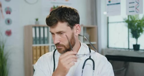Smiling Doctor in White Coat