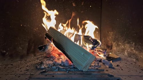 Burning Wood in Fireplace with Flickering Flames