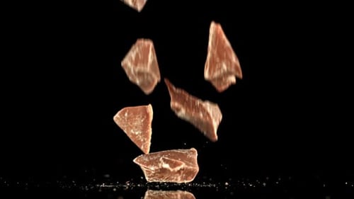 Chunks of Chocolate Falling in Slow Motion