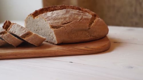 Slice Bread on Cutting Board. Homemade Bread Slice. Baked Product. Close Up