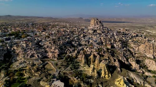 aerial view of the ancient city of Uçshisar and it Castle - Cappadocia, Turkey