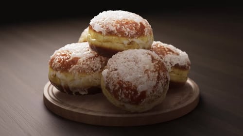 Rotating Glazed Donuts with Coconut Flakes