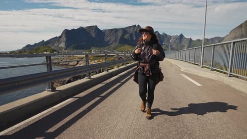 Traveler Girl Hipster with Red Backpack in Norway
