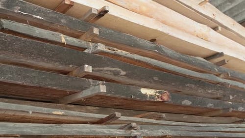 Stacked Lumber Ready for Construction and Carpentry