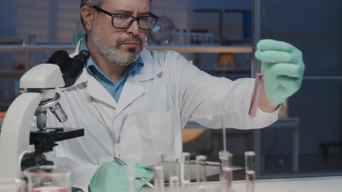 Scientist Working in Bright Medical Research Laboratory